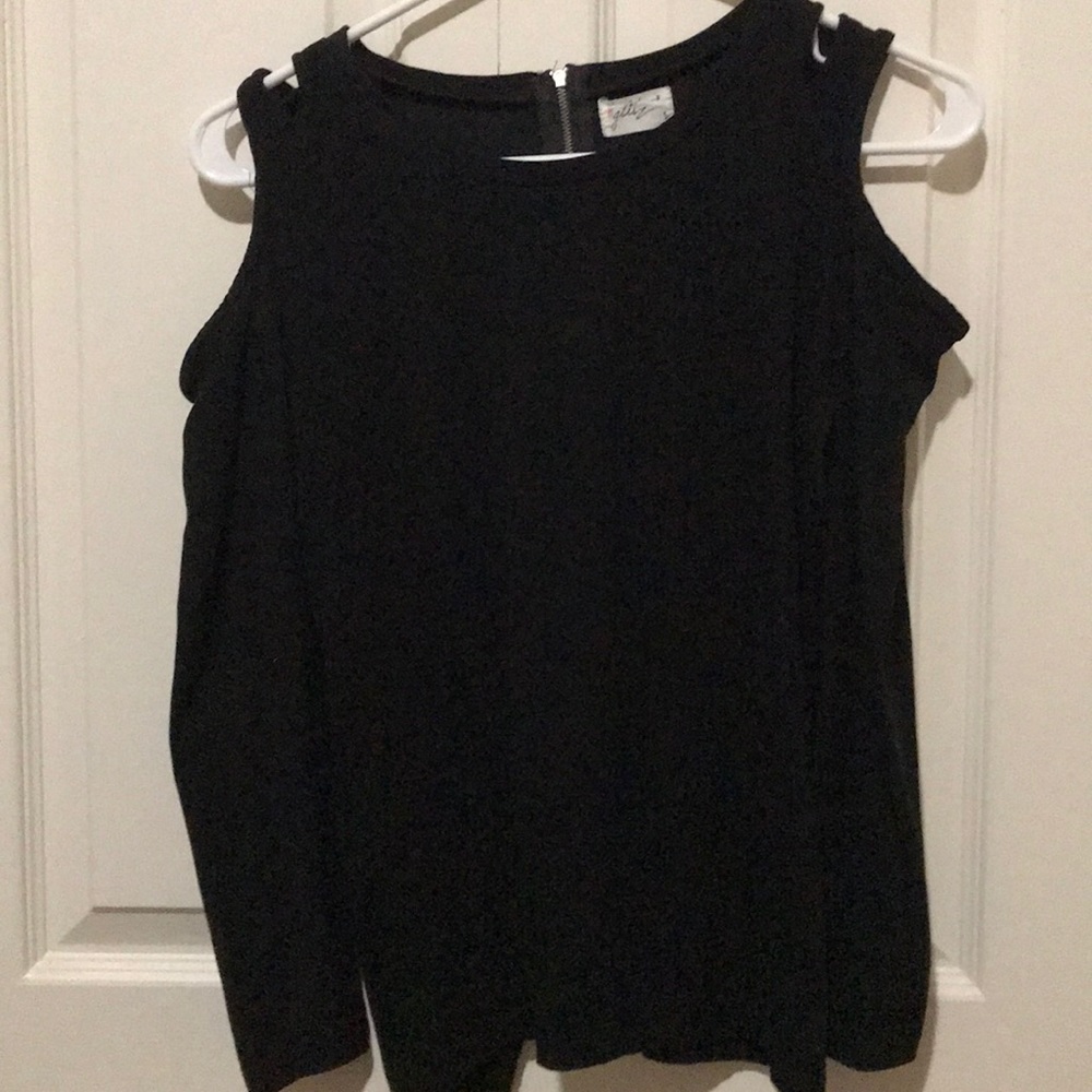 I’m selling a long sleeve shirt from Glitz